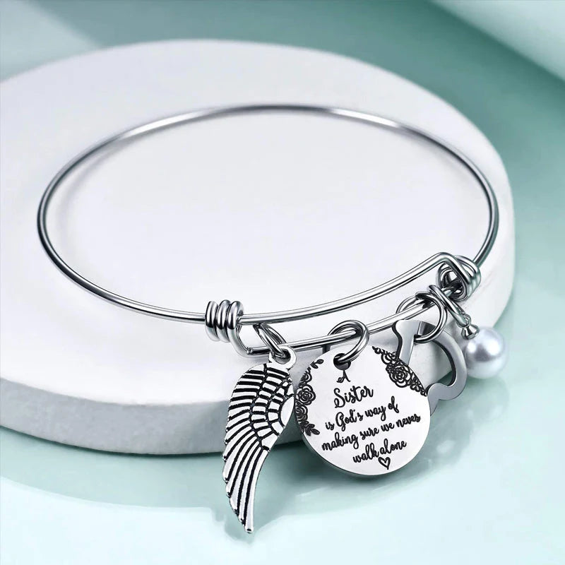 A "Sister is God's Way Of Making Sure We Never Walk Alone" Bangle