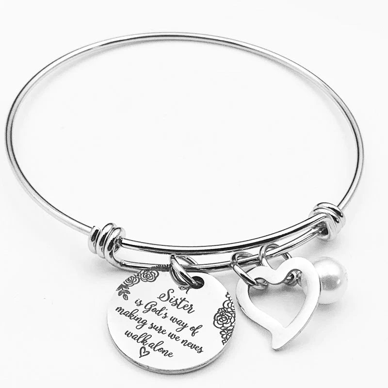 A "Sister is God's Way Of Making Sure We Never Walk Alone" Bangle