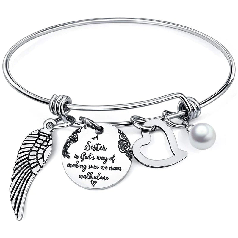 A "Sister is God's Way Of Making Sure We Never Walk Alone" Bangle