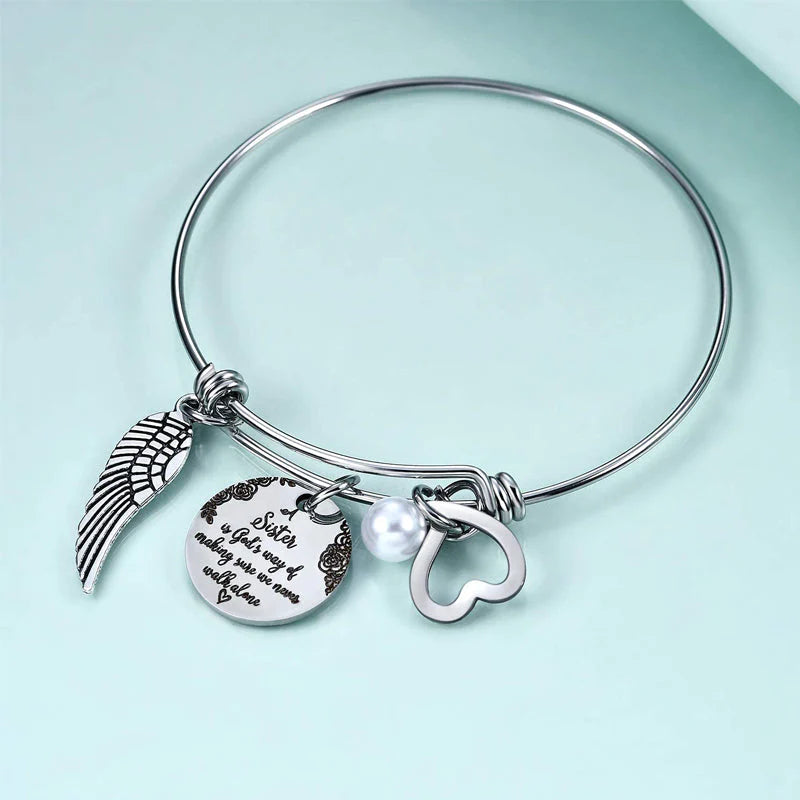A "Sister is God's Way Of Making Sure We Never Walk Alone" Bangle