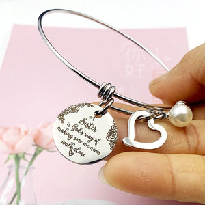 A "Sister is God's Way Of Making Sure We Never Walk Alone" Bangle