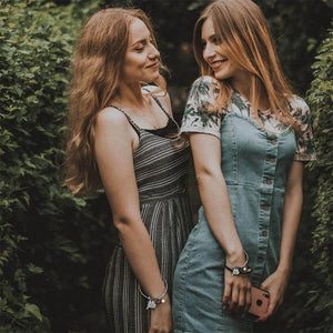 A "Sister is God's Way Of Making Sure We Never Walk Alone" Bangle